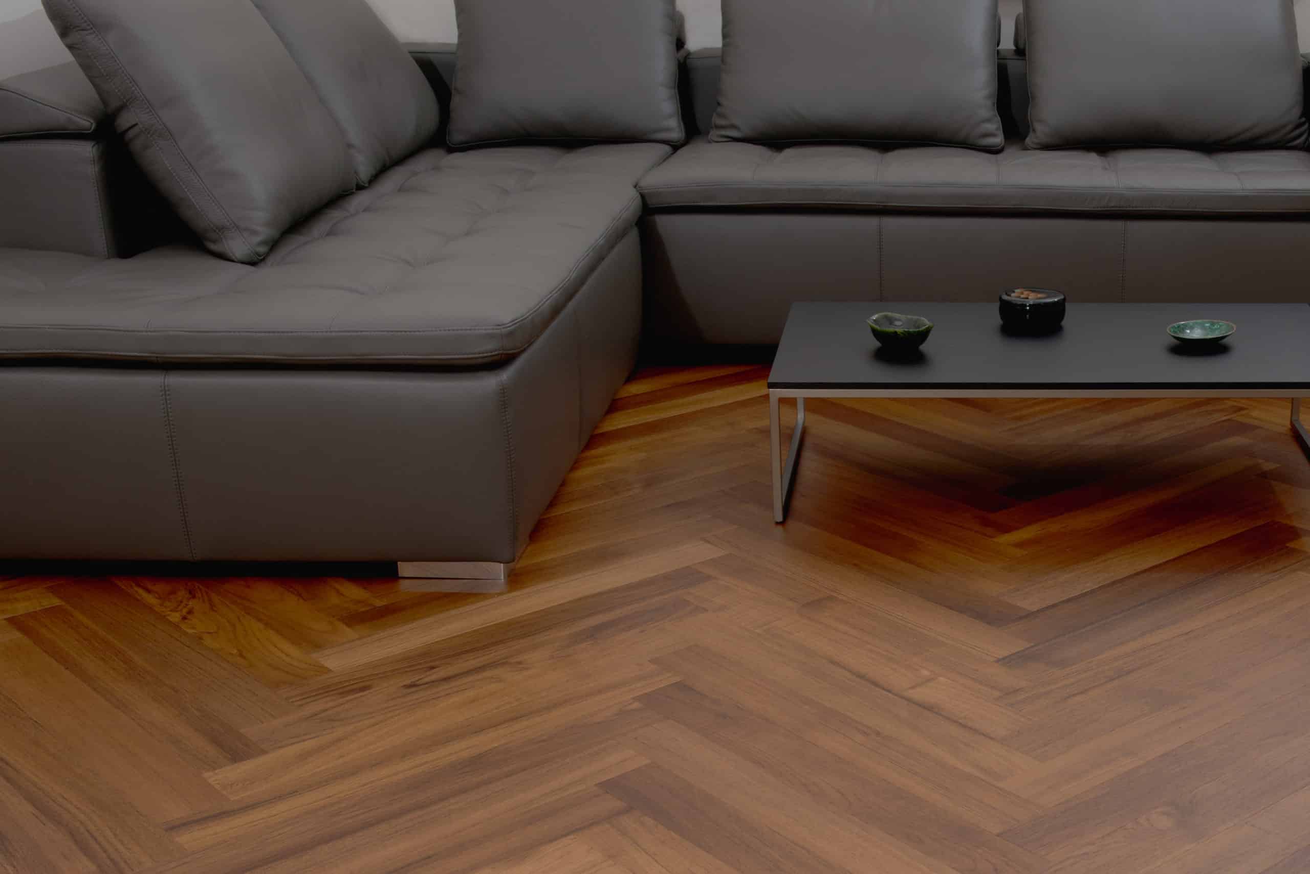 -79 Teak Herringbone with Dark Sofa