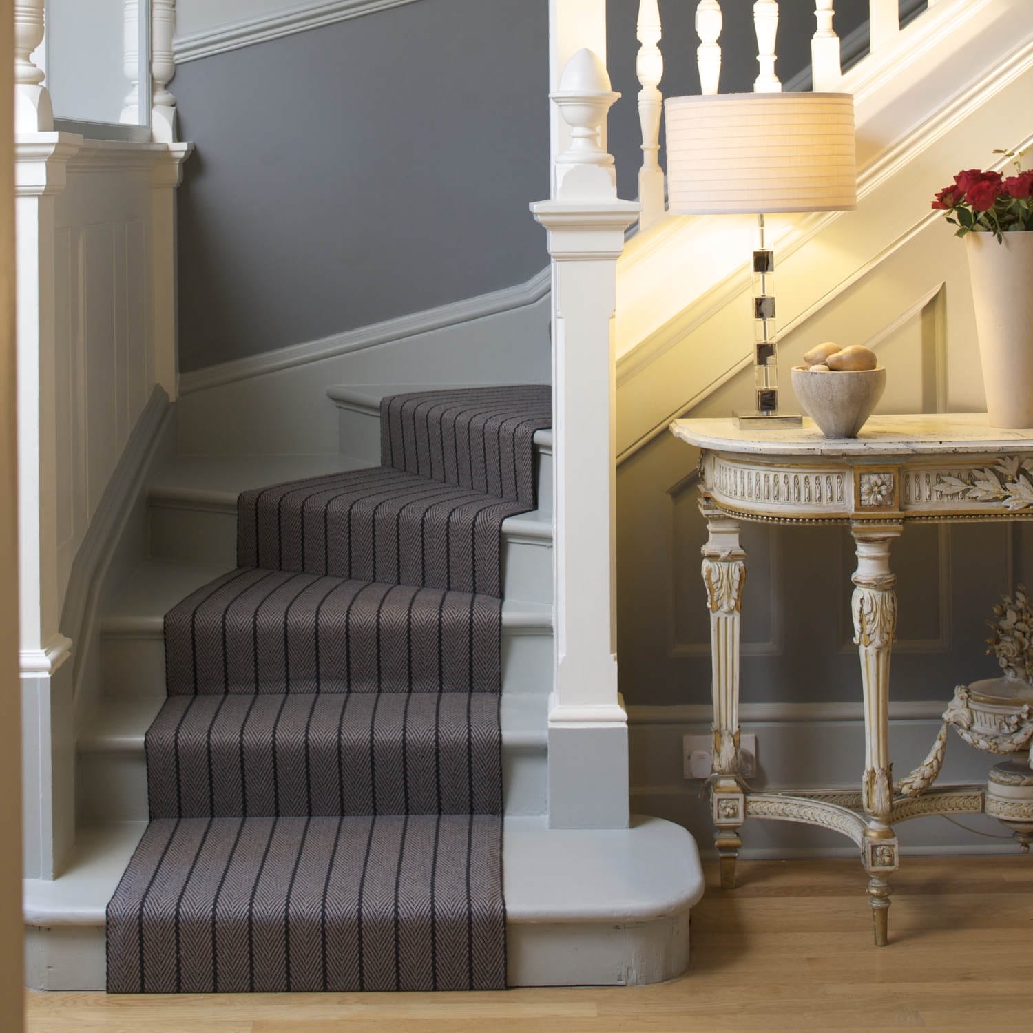 Halle Elephant View herringbone stair runner on winding stairs