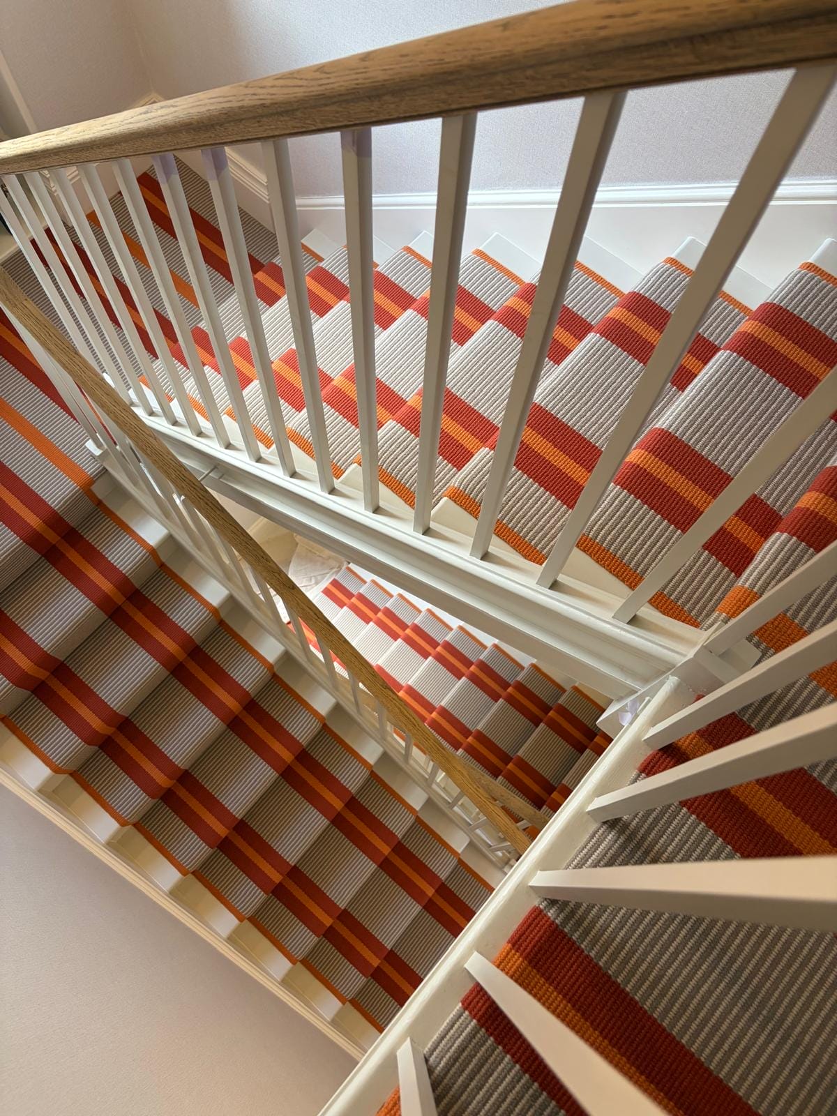 transat-pnt-29-stairs Orange, red and grey flatweave stair runner with bold stripes