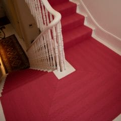 Pink Herringbone Flatweave Runner on stairs
