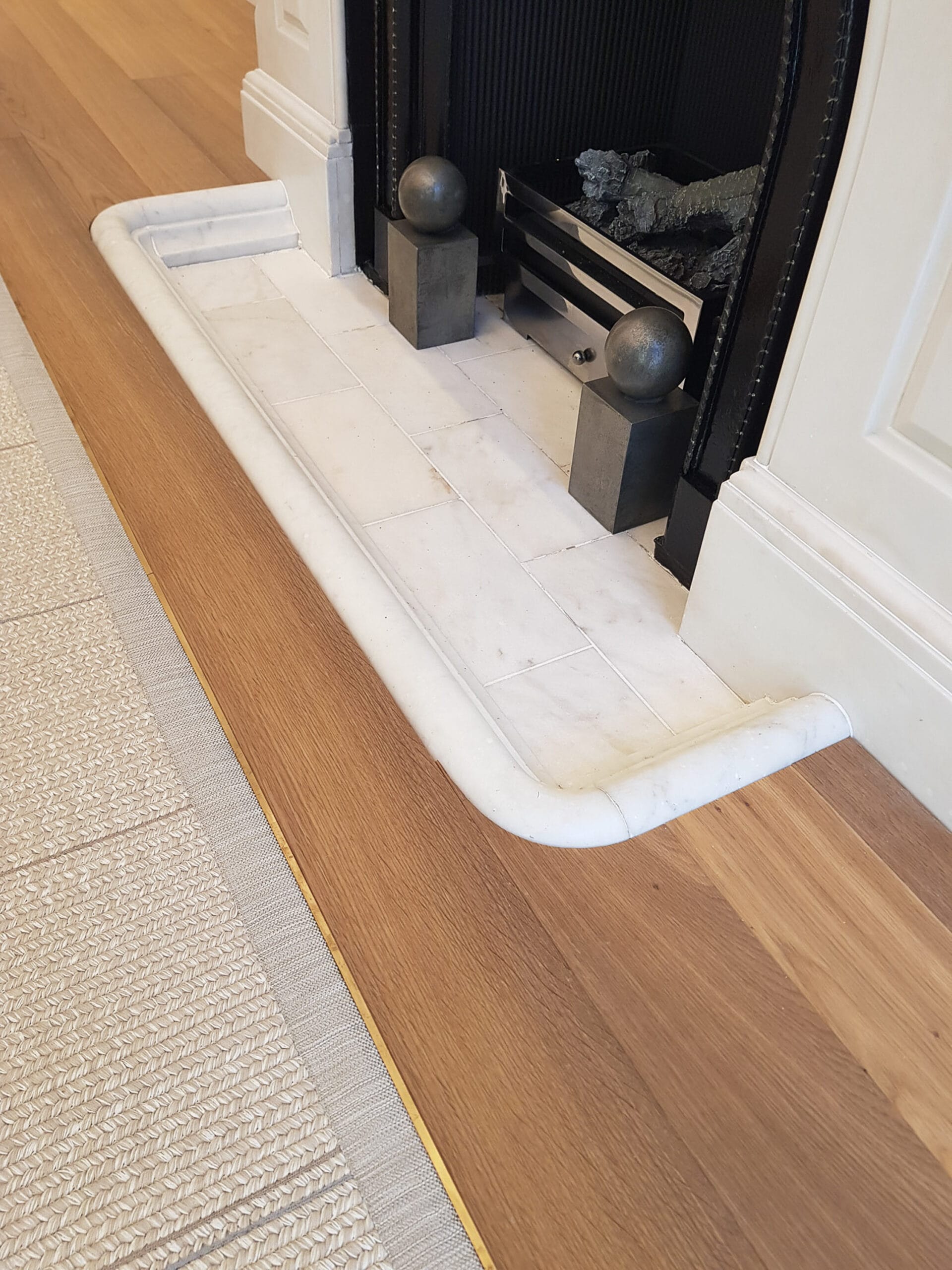 Marble Fireplace with Meribel Oak Flooring