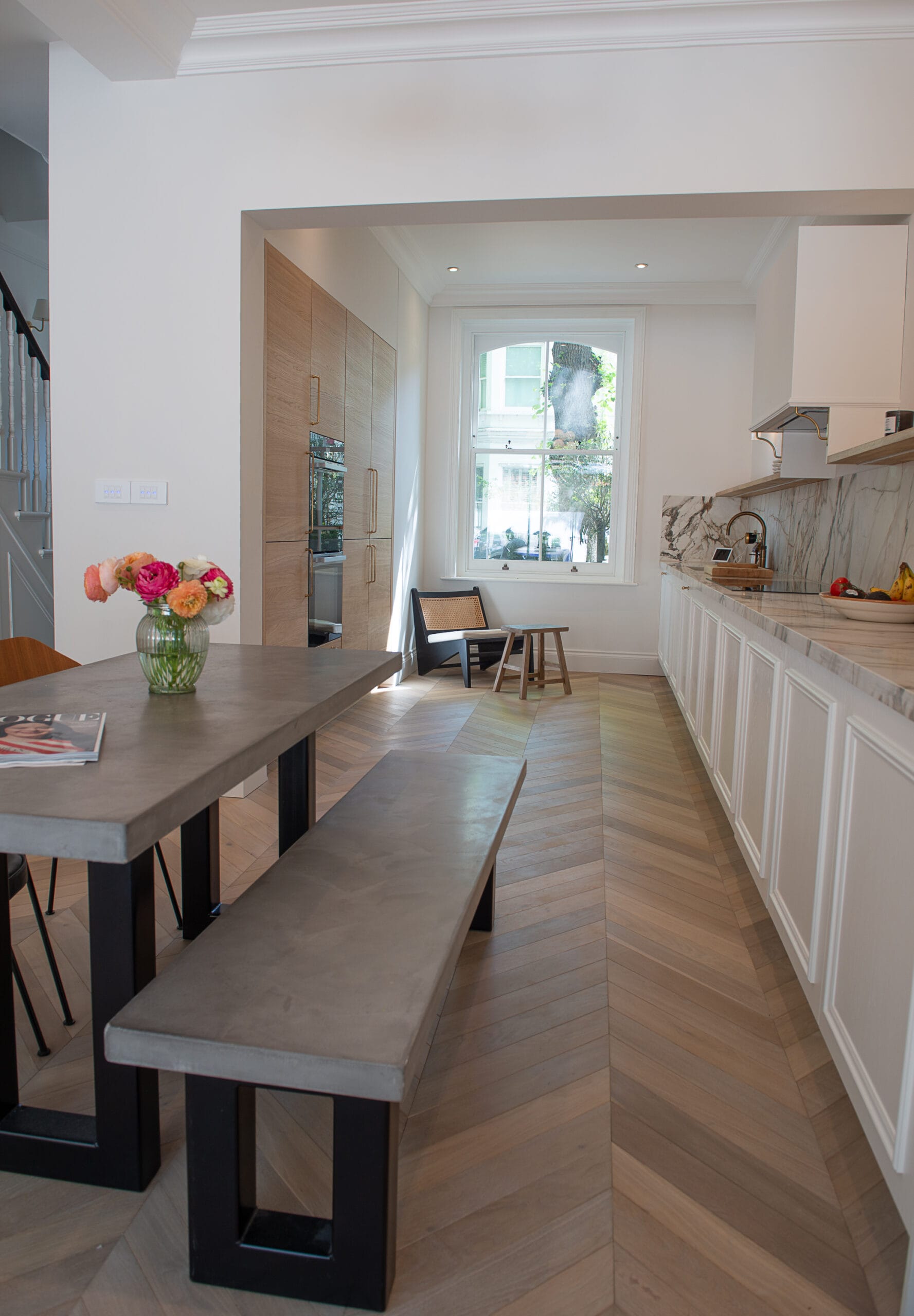 light grey brown oiled oak chevron in kitchen with dining table