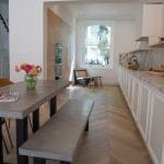 light grey brown oiled oak chevron in kitchen with dining table