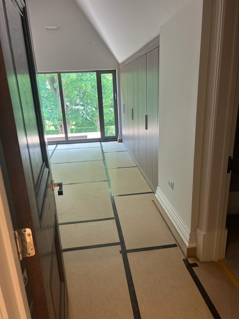 Floor Protection using building paper and hardboard