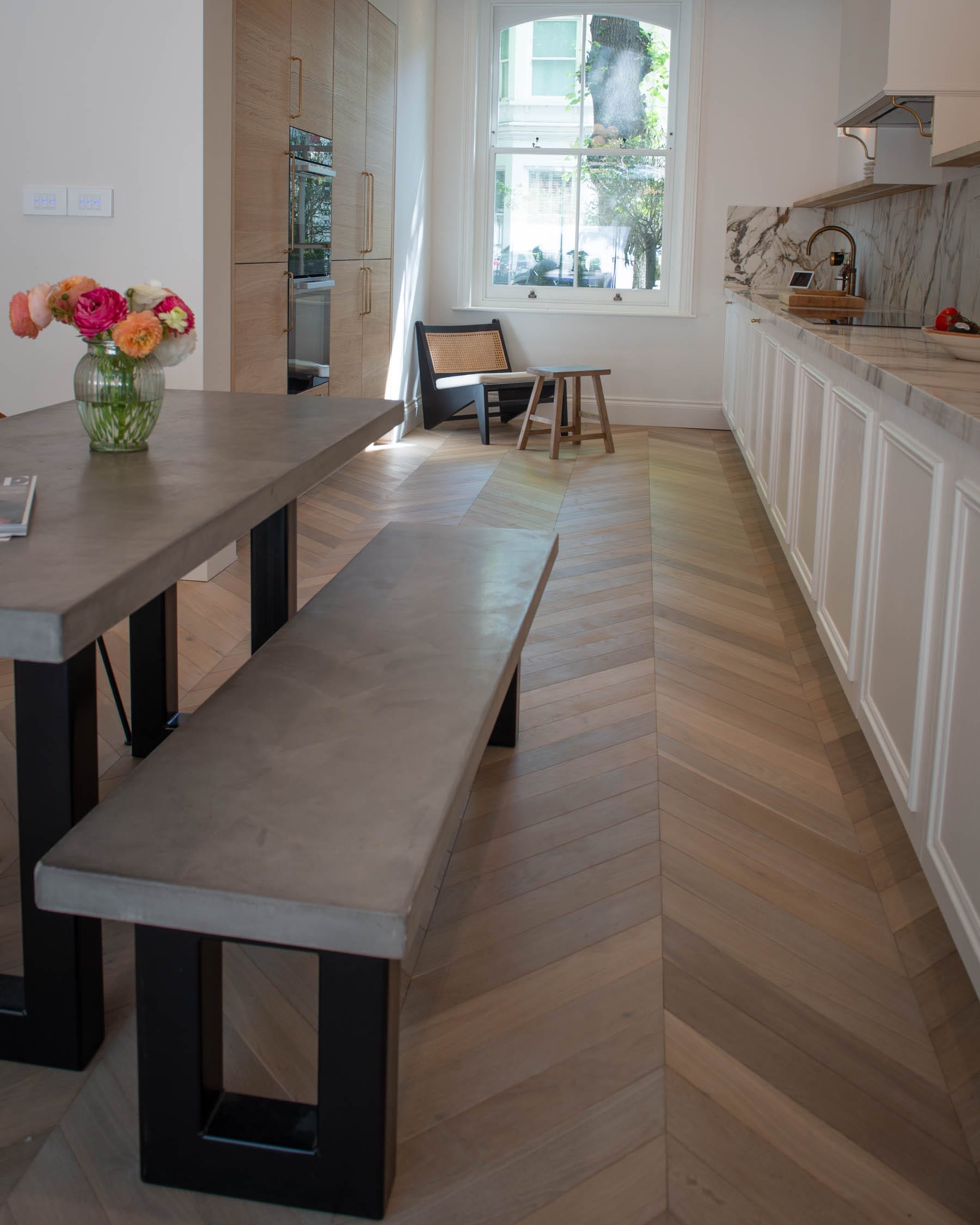 light grey brown oiled oak chevron in kitchen with dining table